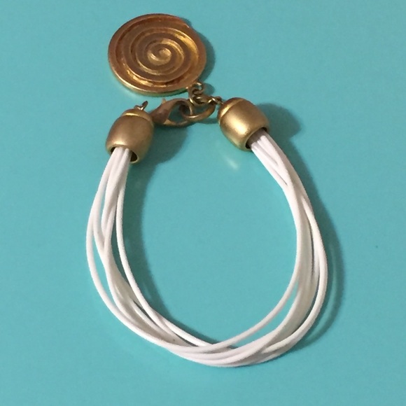 Jewelry - White and gold bracelet with round spiral design